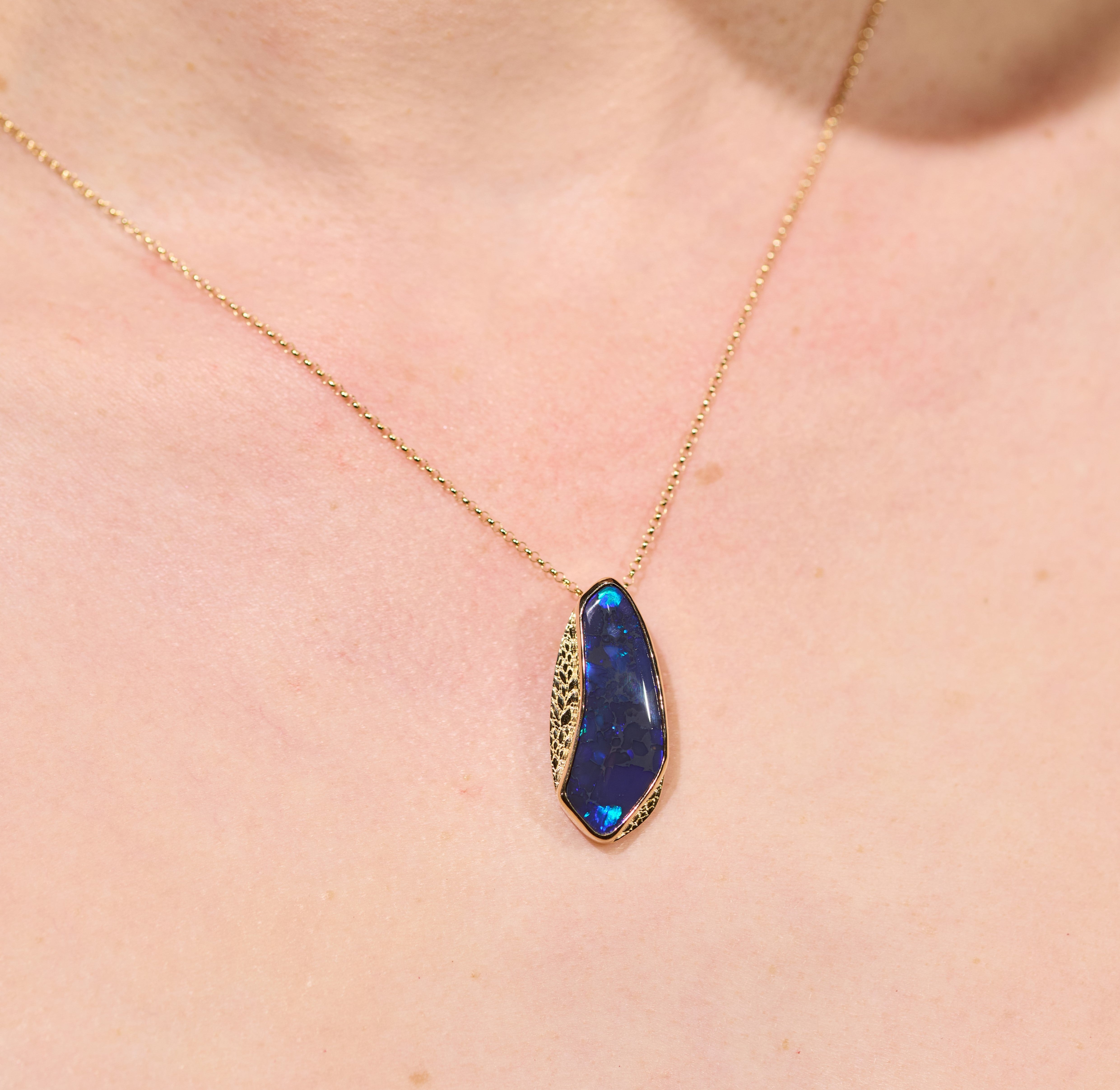 gold opal necklace dark blue