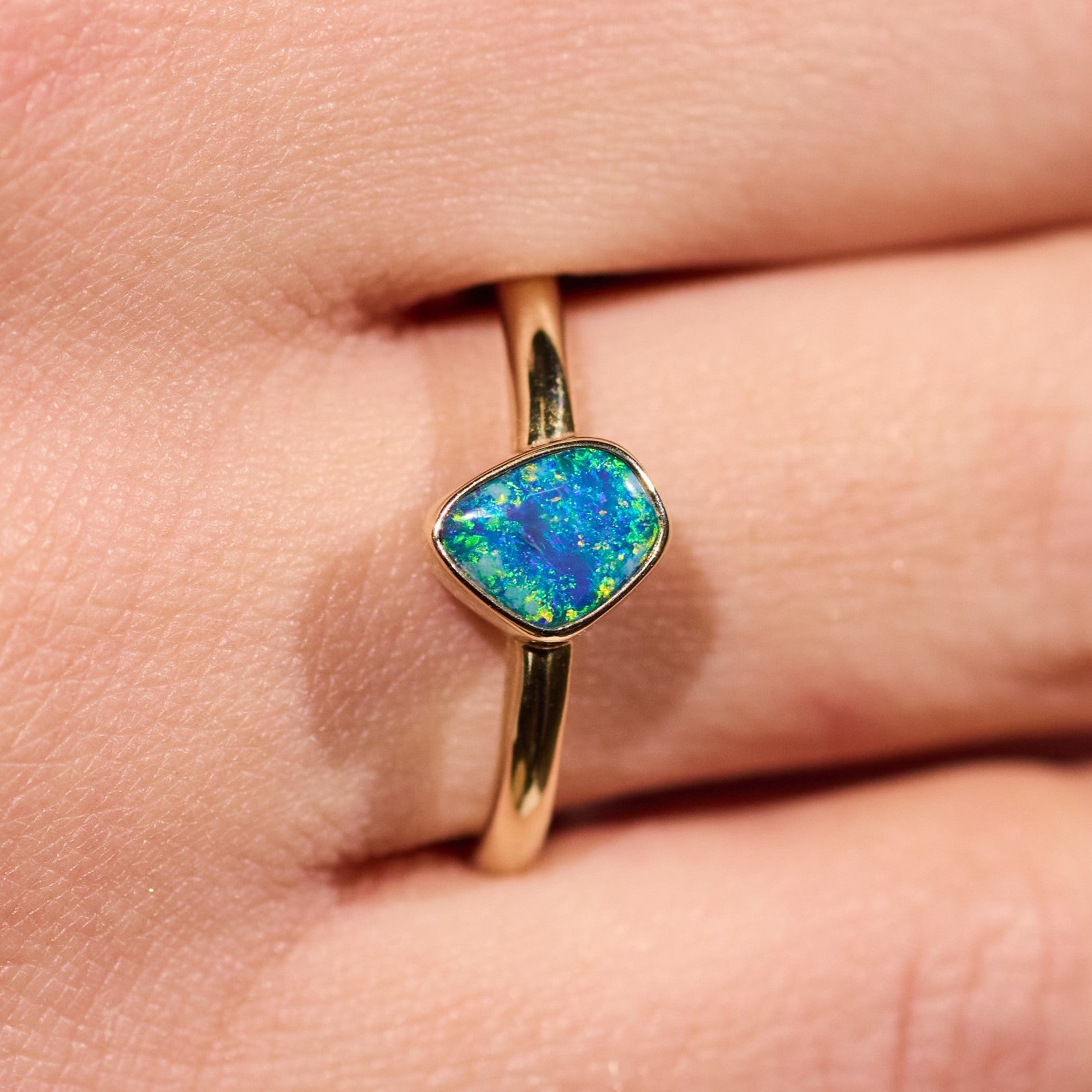 gold opal ring elegant blue green colours