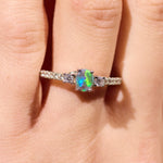 black opal ring elegant engagement design sterling silver claw ring, purple, green and blue stone colours