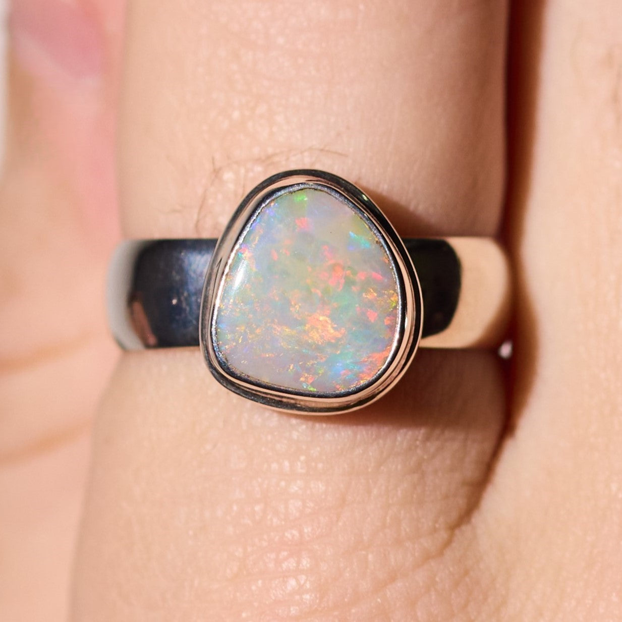 solid opal ring bezel style sterling silver red, green, blue stone colours