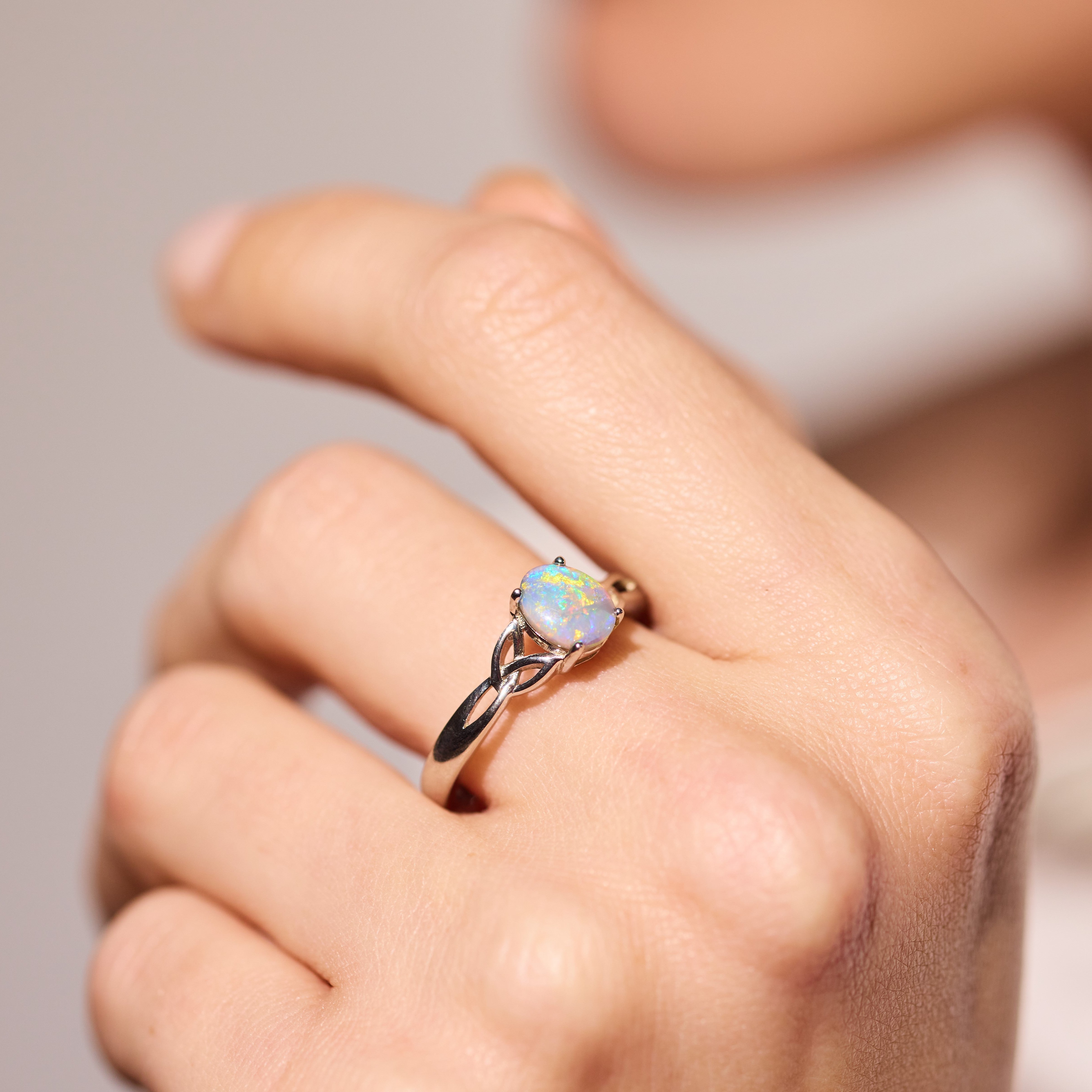 crystal opal ring elegant engagement design sterling silver claw ring, red, blue and green stone colours